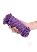 Bound 50 Foot Purple Non-Chafing Bondage Rope held in a hand, showcasing its soft and pliable texture.