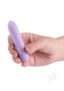 Minnie's Dot Rechargeable Silicone Flexible Bullet Lavender held in a hand, showcasing its compact and ergonomic design.