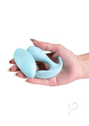Minnie's Pop Silicone Panty Vibe with Remote Blue held in hand, showcasing its compact design and soft silicone.