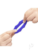 Person stretching the B-Vibe Flex Ring Hex Silicone Cock Ring Blue for better fit and performance.