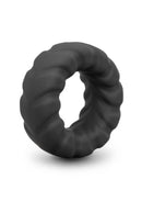 B-Vibe Flex Ring Tread Silicone Cock Ring Black featuring a smooth, textured design for enhanced comfort and durability.