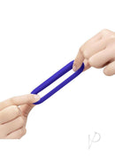 B-Vibe Flex Ring GT Silicone Cock Ring 32mm Blue being stretched between hands, showcasing its flexibility and design.