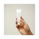 Bijoux Indiscrets Slow Sex Finger Play Gel 1 Oz in a hand, showcasing the intimate pleasure product.