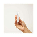 Bijoux Indiscrets Slow Sex Clitoral Balm 0.34 Oz held in a hand, showcasing its elegant packaging.