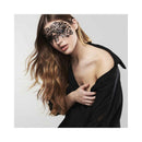 Bijoux Indiscrets Dalila Decal Eye Mask worn by a model with long wavy hair, showcasing glamour and seduction.