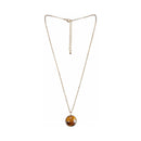 Bijoux Indiscrets Horoscope Kit Gemini natural zodiac necklace in gold with tiger's eye pendant.