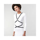 Bijoux Indiscrets Maze Multi-way Body Harness worn over a white dress showcasing edgy elegance and versatile design.