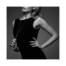 Bijoux Indiscrets Magnifique Chain Necklace Whip Silver worn as a statement necklace in an elegant black outfit.