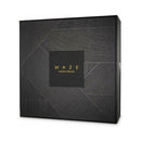 Packaging of Bijoux Indiscrets Maze I-Harness Black featuring a stylish geometric design.