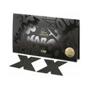 Bijoux Indiscrets Flash Reusable Glitter Pasties Cross Black packaging with two glitter pasties inside on a black background.