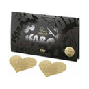 Bijoux Indiscrets Flash Reusable Glitter Pasties Heart Gold in glittery heart shapes, perfect for stylish outfits.