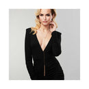 Elegant model showcasing Bijoux Indiscrets Magnifique Tickler Pendant Gold with a chic black dress.