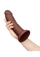 Together 8.5 Inch Realistic Dildo Suction Base Chocolate held in hand, showcasing its lifelike design and color.