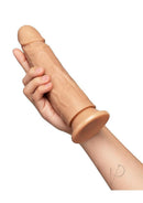 Together Realistic Dildo with Suction Base 7.75 inch Caramel held in hand for pleasurable use.