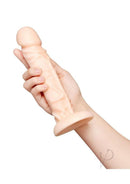 Together 8.25 Inch Realistic Dildo Suction Base Vanilla in hand, showcasing its lifelike detail and vanilla shade.