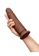 Together Realistic Dildo Suction Base 7.75 Inch Chocolate held in hand, showcasing its lifelike design and textured detail.