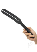 Nocturnal Collection Silicone Slap Paddle Black held in hand, showcasing dual-ended design for impact play.