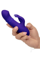 California Dreaming Haight Ashbury Hottie Vibrator Purple held in hand, showcasing its sleek design and dual stimulation features.