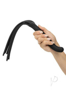 Hand holding the Nocturnal Collection Silicone Flogger Black with soft tassels for playful exploration.