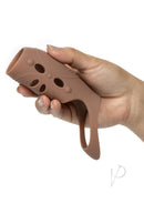 Performance Maxx Silicone Open-Ended Penis Sleeve Caramel in hand showcasing its design and texture.