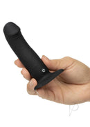 Onyxxx Rechargeable Silicone Beginner Stud Black held in hand, showcasing sleek design and user-friendly controls.