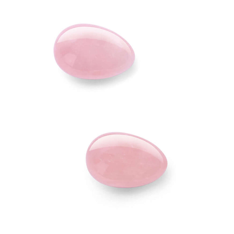 Le Wand Crystal Yoni Eggs Rose Quartz, set of two polished rose quartz yoni eggs for pelvic floor training.
