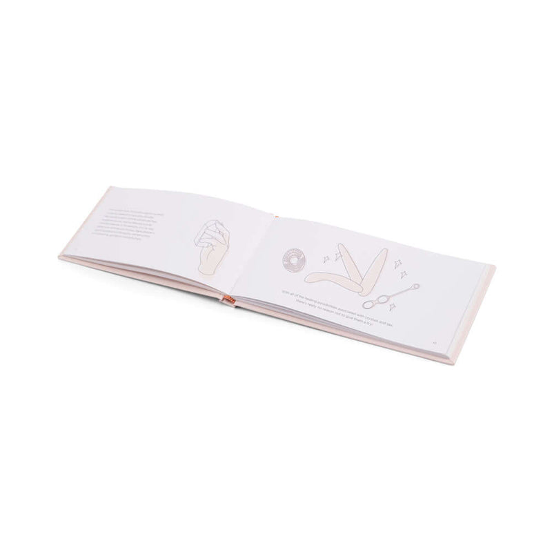 Le Wand Crystal Yoni Eggs Rose Quartz instructional book with diagrams and tips for pelvic floor training.