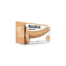 Realrock Hollow Strap-on With Balls 9 inch Tan packaging showcasing its features and size.