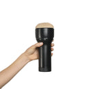 Feel Natalia Starr Stroker By Kiiroo held in hand, showcasing personal pleasure experience with lifelike design.