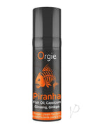 Orgie Piranha Power Cream for Him 0.5 Oz in a sleek black bottle with orange fish design and label.