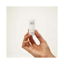 Bijoux Indiscrets Slow Sex Full Body Solid Perfume 0.28 Oz held in a hand, showcasing the product packaging.