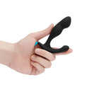 b-Vibe Rocker Rocking Weighted Prostate Plug Black in hand, showcasing ergonomic design and comfort features.