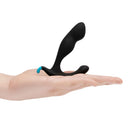b-Vibe Rocker Rocking Weighted Prostate Plug Black held in a hand showcasing its ergonomic design and shape.