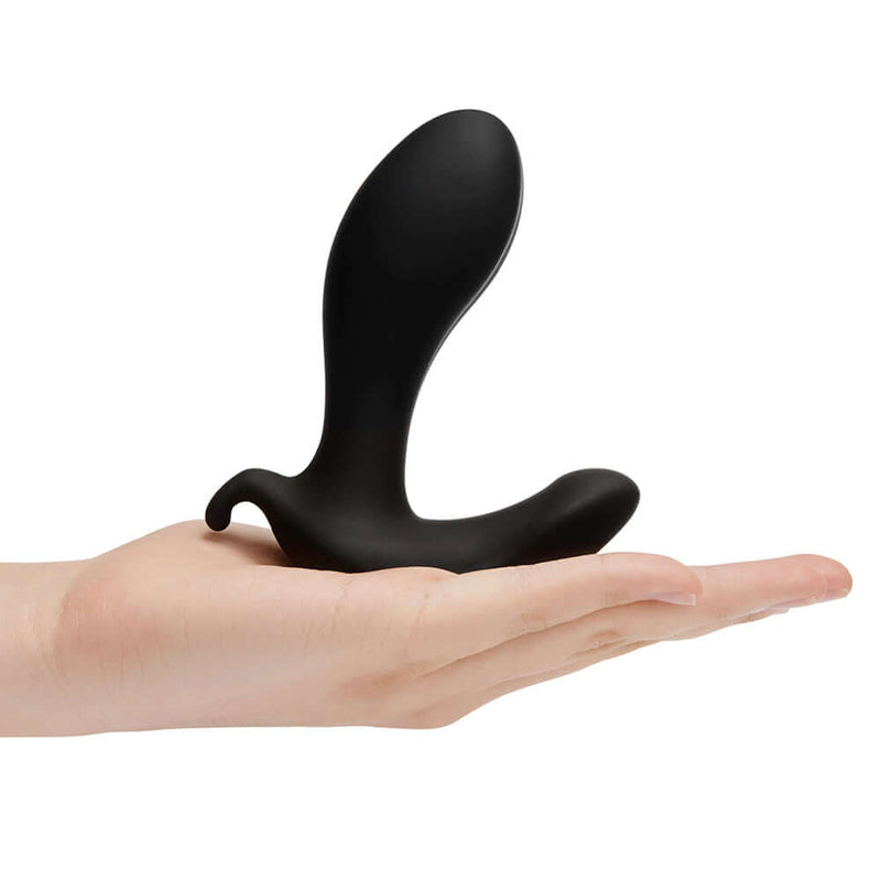 b-Vibe Expand Expanding and Vibrating Remote Control Plug Black held in a hand for scale.