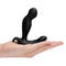 b-Vibe 360 Rotating and Vibrating Remote Control Plug Black held in a hand, showcasing its sleek design.