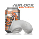 Oxballs Airlock Air-lite Vented Chastity Cage White Ice next to a beverage can for scale.