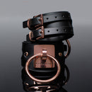 Coquette Pleasure Collection Cuffs made of vegan leather with polished metal hardware for stylish restraint play.