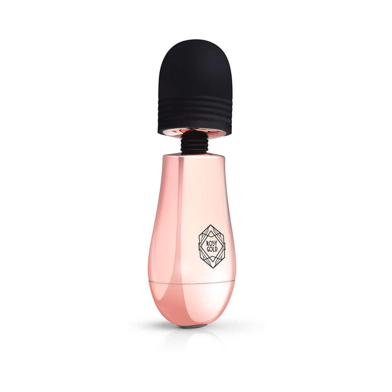 Rosy Gold Nouveau Mini Massager in a sleek pink design with a black cap and logo.