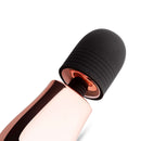 Rosy Gold Nouveau Mini Massager close-up showing silicone head and ABS body for travel-friendly pleasure.