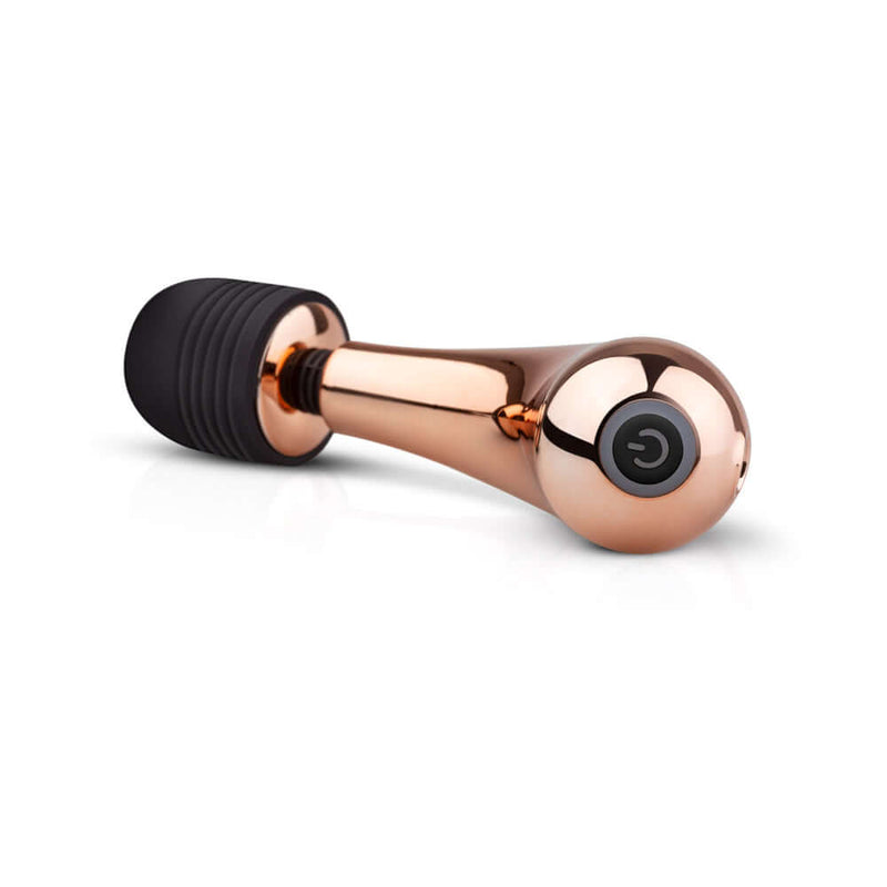 Rosy Gold Nouveau Mini Curve Massager with sleek design and ergonomic handle for relaxation and pleasure.