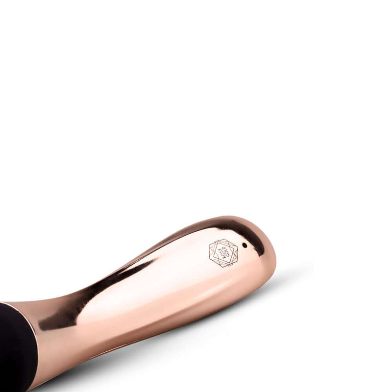 Rosy Gold Nouveau Curve Massager metallic handle detail with logo and smooth finish