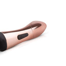 Close-up of the Rosy Gold Nouveau Curve Massager showcasing its sleek design and control buttons.