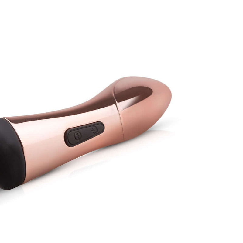 Close-up of the Rosy Gold Nouveau Curve Massager showcasing its sleek design and control buttons.