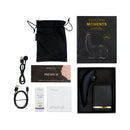 We-Vibe Golden Moments 2 Couples Vibrator Black with accessories including USB charger and We-Vibe lube.