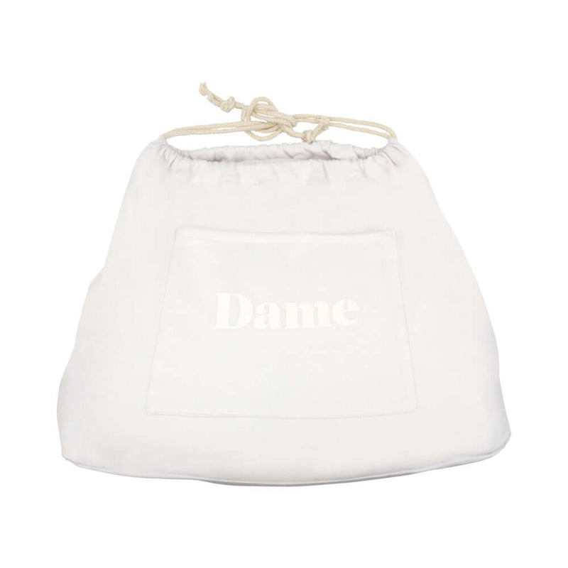 Dame Pillo Sex Pillow Oat storage bag with drawstring and logo for discreet storage.