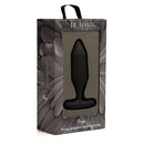 Je Joue Onyx Vibrating Butt Plug Black packaging on display, showcasing its luxurious design and features.