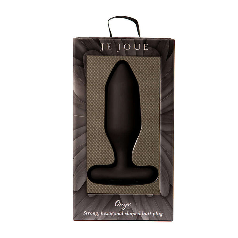 Je Joue Onyx Vibrating Butt Plug Black in elegant packaging with hexagonal design for unique pleasure.