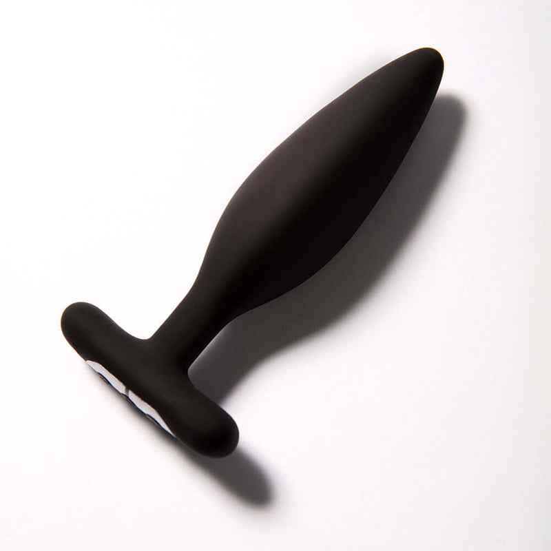 Je Joue Egon Vibrating Butt Plug Black displayed on a white background, highlighting its sleek design and soft material.