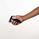 Person holding the Je Joue Egon Vibrating Butt Plug Black for demonstration.