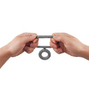 Shaft Model D Double C-Ring Grey Size 2 being held and stretched between two hands.